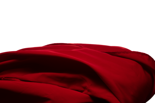 Red curtain fabric flying in curve shape, Piece of textile red curtain fabric throw fall in air. White background isolated, dark shading environment