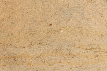 Wall background. Stone beige texture.