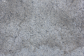 Asphalt background. Dark grey bitumen texture.