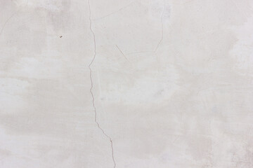 Grey cracked wall background.