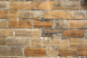 Exterior stone block wall background