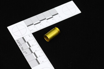 CSI photomacrographic Scale with shell casing from bullet