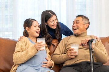 Portrait of enjoy happy love asian family senior mature father and young daughter smiling play laughing and having fun together at home, care, elderly, insurance.happy family and Father Day concept