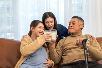 Portrait of enjoy happy love asian family senior mature father and young daughter smiling play laughing and having fun together at home, care, elderly, insurance.happy family and Father Day concept