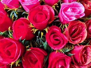 Close Up of Red and Pink Roses in a Bouquet
