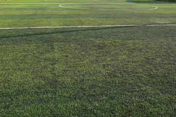 artificial green grass turf sport soccer field with black rubber granules infill