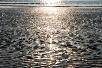 View of the sunlight reflection on the beach
