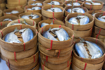 fresh fish in rattan basket for sale in seafood fresh market