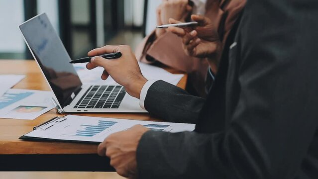 Team of business people are meeting to analyze data for marketing plan,Market research reports and income statistics, Financial and Accounting concept.