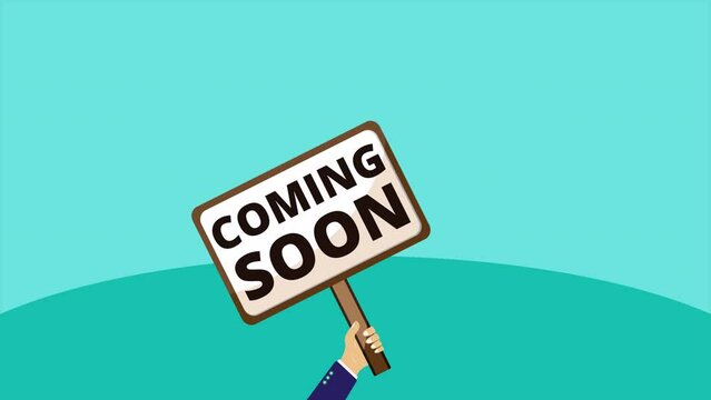 Hand with coming soon sign. Best for editing video materials.