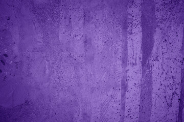 Purple textured concrete wall background