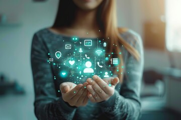 A person holding holographic digital communication icons in their hands, symbolizing online connectivity and social interaction.