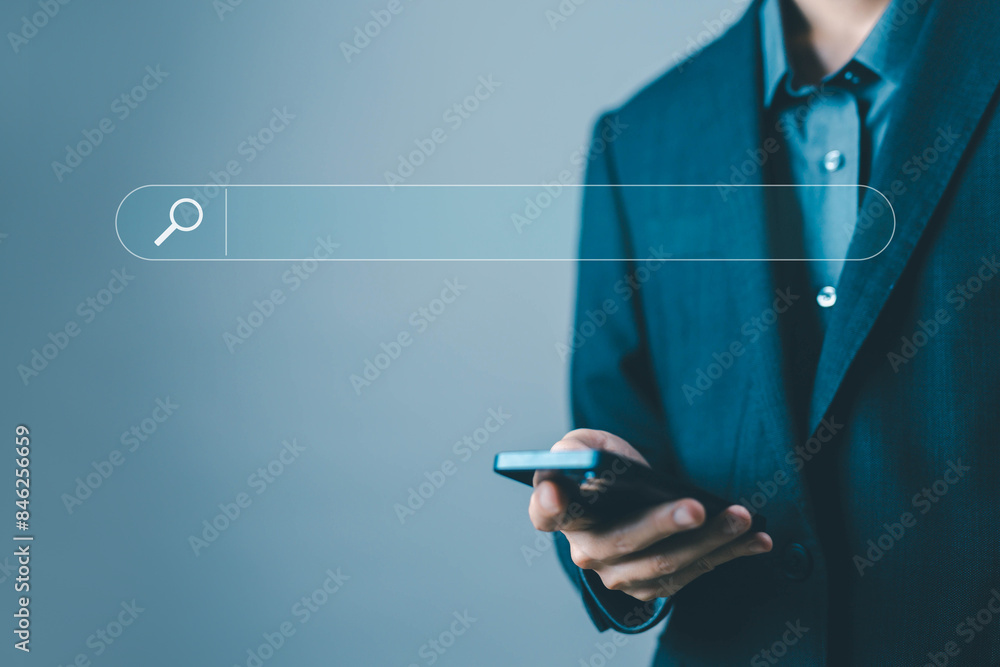 Poster businessman using a smartphone to search engine. concept of keywords show a search bar. web browser 