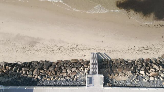 Top View Of Beach Resort On Sunny Morning In Dennis Port, Nantucket Sound, Massachusetts. static drone shot