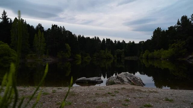 Shot of revealing Pinders Pond near town of Roxburgh in New Zealand during evening.
