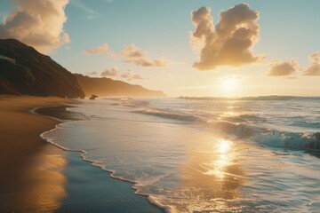 Fototapeta premium The beach is calm and peaceful with the sun setting in the background