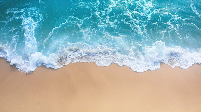 Ocean waves on the beach, clear blue water, high view