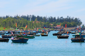 Photography capturing the traditional Vietnamese boats, showcasing their unique designs and the serene beauty of Vietnam's waterways. Perfect for highlighting cultural heritage and maritime life in Vi