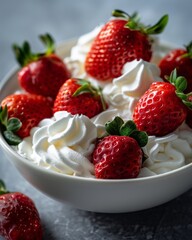 Bowl of strawberries and whipped cream