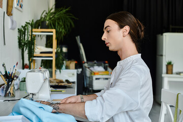 A young man, dressed in white, meticulously sews discarded fabrics, transforming them into unique...