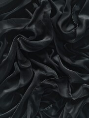 Fototapeta premium A black fabric with a shiny texture