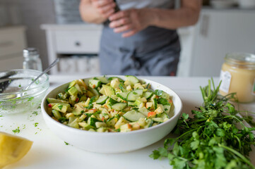 Avocado, apple, cucumber Salad. Delicious healthy summer salad 