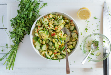 Avocado, apple, cucumber Salad. Delicious healthy summer salad 