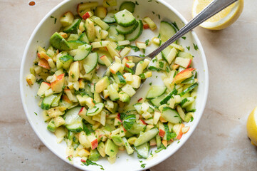 Avocado, apple, cucumber Salad. Delicious healthy summer salad 