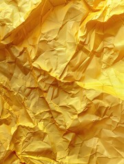 A yellow piece of paper with a rough texture