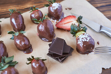 Strawberries and chocolate. Preparation of sweet dessert.