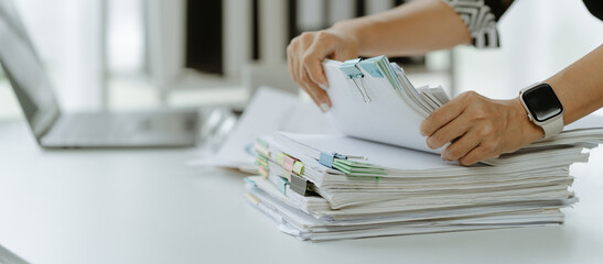 Business Documents, Auditor businesswoman checking searching document legal prepare paperwork or report for analysis TAX time,accountant