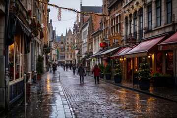 Obraz premium A moody, rain-soaked cobblestone street, lined with historic buildings and festive decorations, evokes a quaint European ambiance