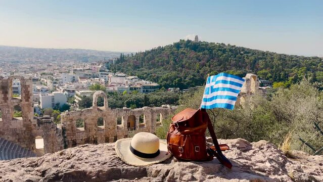 Travel destination, tour tourism in Greece- bag, hat and flag in Athens, Acropolis