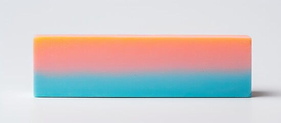 Fototapeta premium A vibrantly colored eraser captured in a close up shot with empty space around it on a white backdrop. copy space available