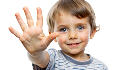 A cheerful portrait of a little boy showing his finger  with joy