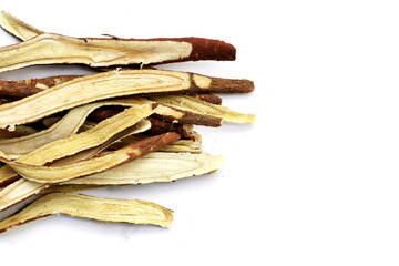 Liquorice sliced on white background.