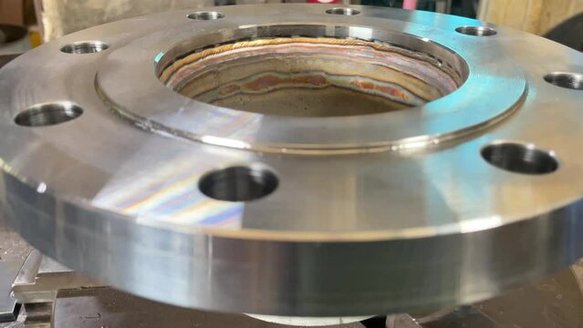 Welding seam on a pipeline close-up, side view.