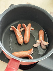 Pan frying Sausage