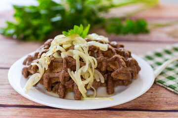 fried liver waffles with onions and herbs