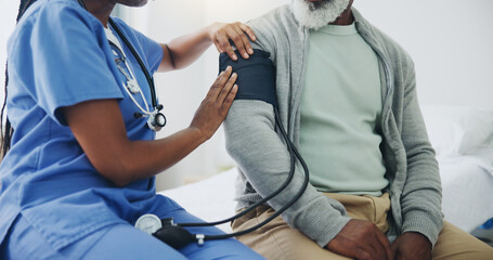 Hands, senior man and nurse with monitor for blood pressure, medical test or cardiovascular. Black people, mature patient or caregiver for hypertension diagnosis, healthcare or consultation in bed