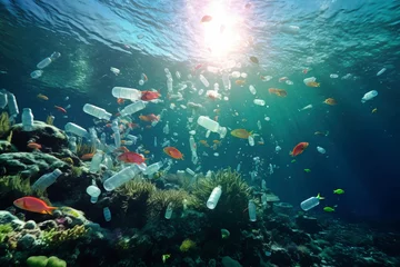 Fotobehang A vibrant coral reef is marred by plastic bottles and other debris, a stark reminder of the impact of pollution on marine ecosystems © Anoo