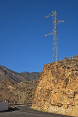 Power line at the water reservoir Presa del Parralillo on Gran Canaria,Canary Islands,Spain,Europe
