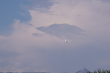 Aircraft soaring against twilight sky