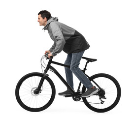 Young man riding bicycle on white background