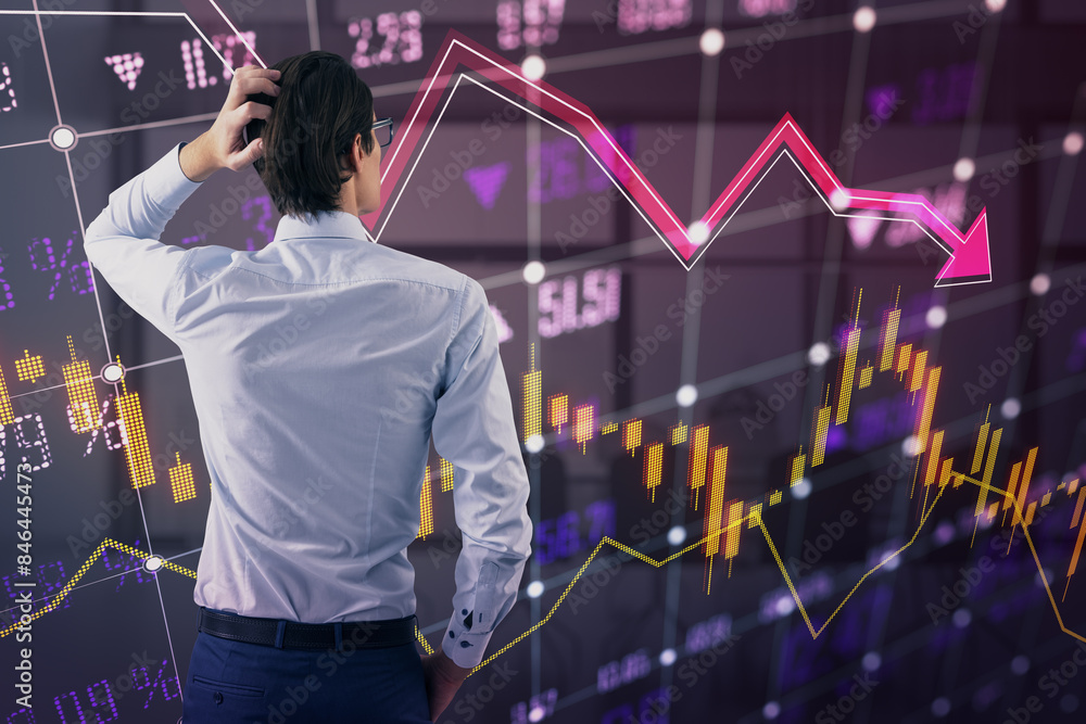 Poster back view of stressed young european male looking at glowing falling forex chart and index grid on b