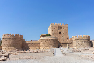 Almeria Castle, standing on a summer day of intense heat and clear skies.