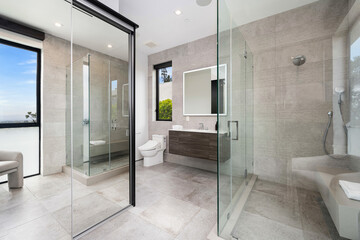 Contemporary bathroom featuring a spacious glass walk-in shower