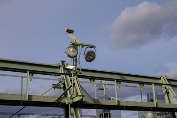 Lamp on the green metal bridge in New York Harbor
