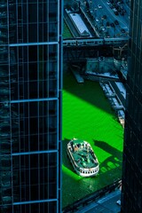 Boat on the green river in Chicago for Saint Patrick's Day