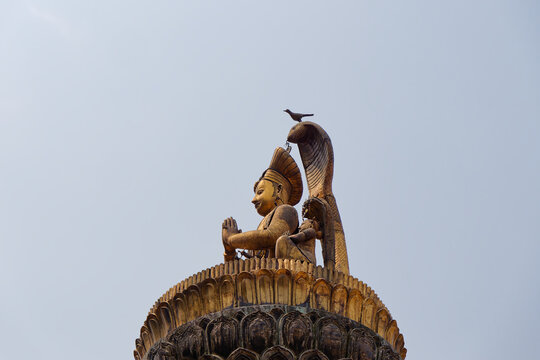 Yog Narendra Malla statue pillar at Patan Square, Kathmandu, Nepal, Asia